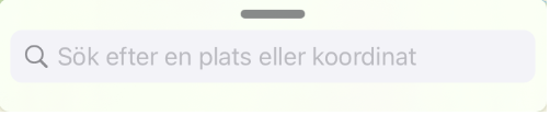 Avlångt vågrätt fält med ett förstoringsglas inuti.